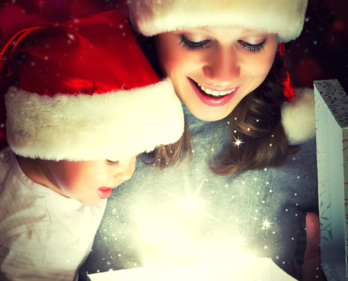 Mother and child discovering a magical personalised Christmas surprise together